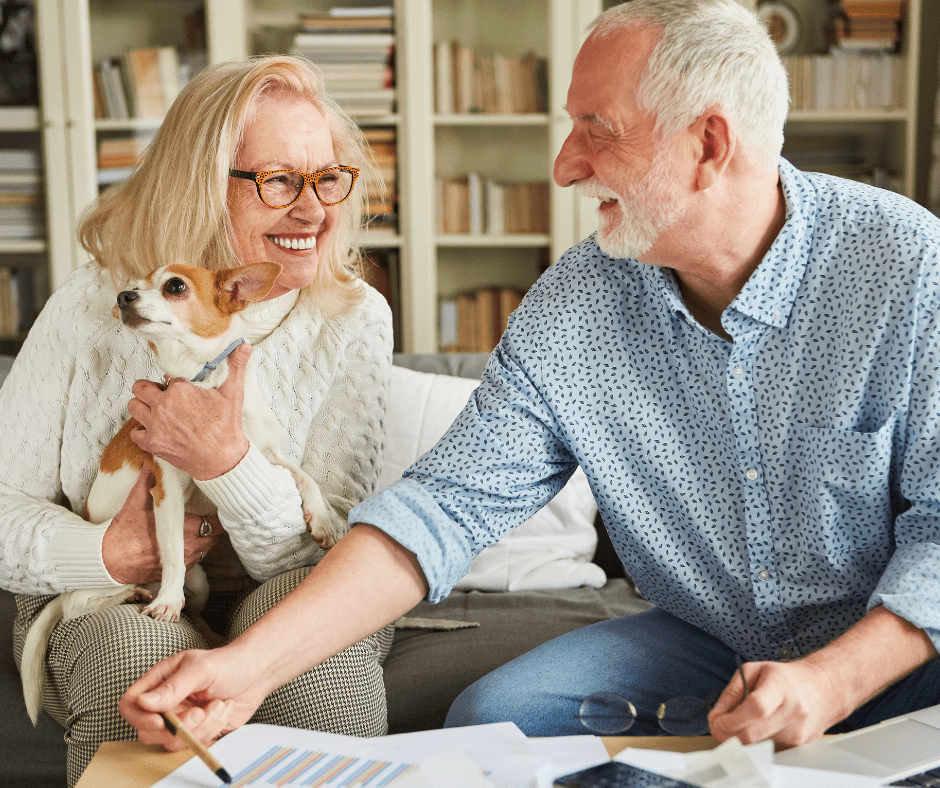 April 25 Events Page Image - Inspirations of Northbrook Elderly man and woman smiling and holding small dog